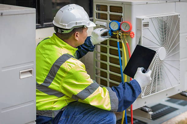 Professional Air Conditioning Repair technician working in Elmo, TX